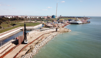 piling rig on a beach on a sunny day
